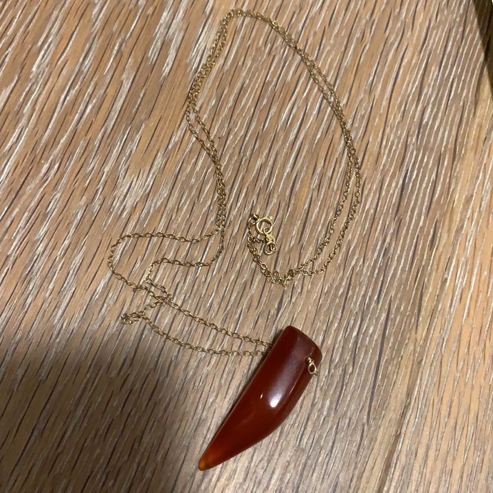 Horn necklace on gold chain